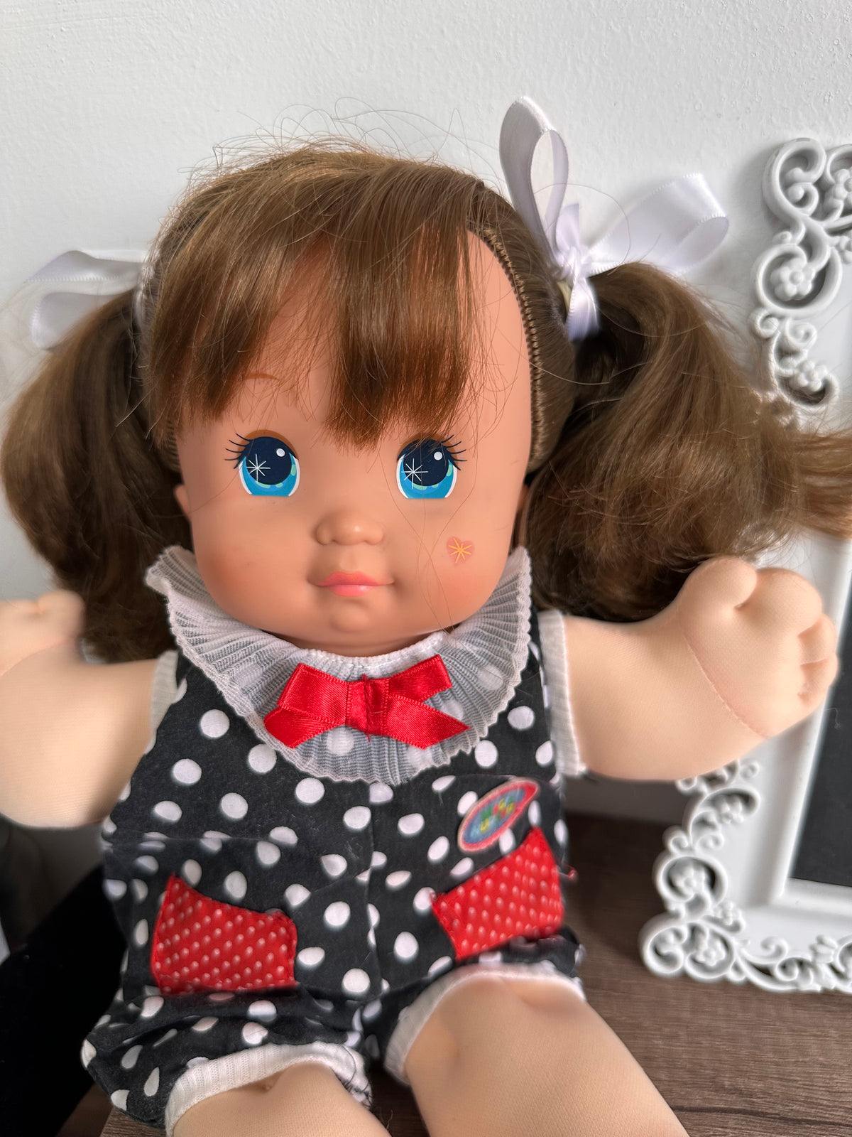 Muñeca Magic nursery castaña