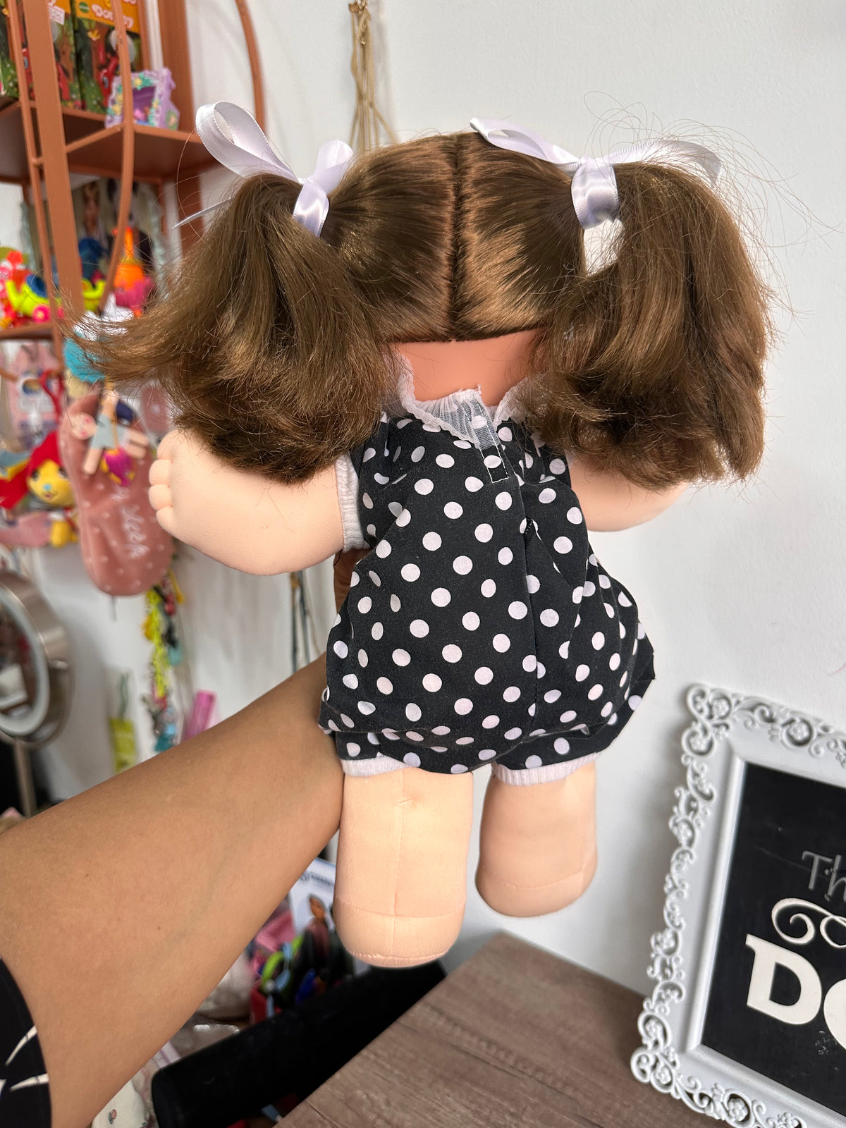 Muñeca Magic nursery castaña